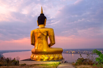 Obraz premium Big Statue of Golden Buddha on a mountain, Wat Phou Salao,near Mekong river Laos, Pakse