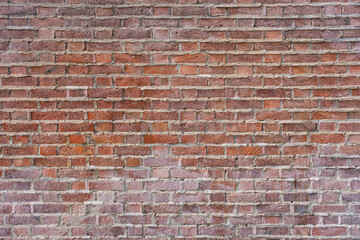 Classic old red and dark red brick wall background