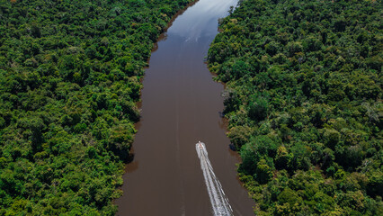 AERIAL PHOTOS OF THE NANAY RIVER AND BOATS NAVIGATING IN ITS WATERS, IN THE PERUVIAN AMAZON JUNGLE,...