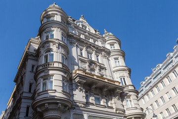 Fragment of historical building facade with architectural decorations, Vienna Center