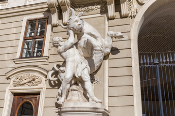 Sculpture of Hercules catches the Cretan bull in Hofburg, Vienna