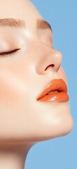 Obraz premium Woman with orange lipstick and a tan face