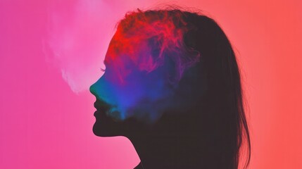 Silhouette of woman with colorful smoke effect