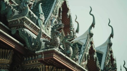 Ornate dragon sculptures adorn temple roof.