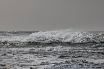 Beautiful breaking white waves