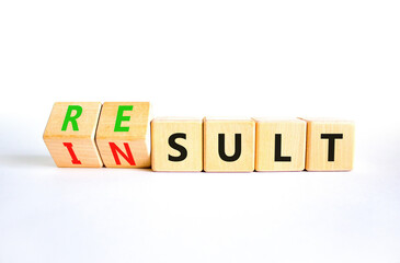 Result or insult symbol. Concept words Result Insult on wooden cubes. Beautiful white table white background. Business and result or insult concept. Copy space.