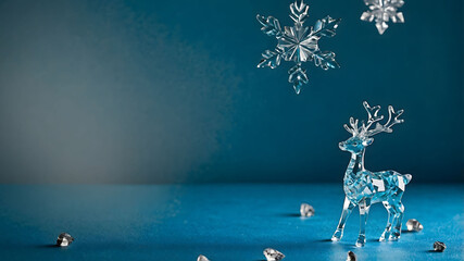 Crystal reindeer figurine and a crystal snowflake against a soft blue gradient background.