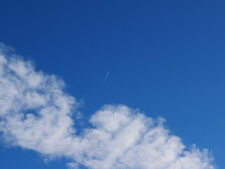 Airplane clouds, vapor trail in winter, Colorado