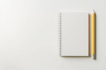 Blank notebook with yellow pencil on minimalistic background, in
