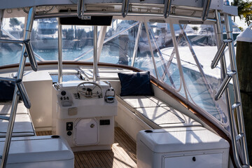 Offshore fishing boat covered helm area with seating area in Islamorada, Florida Keys