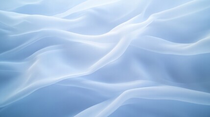 Obraz premium Soft flowing fabric in shades of blue creates serene, tranquil a