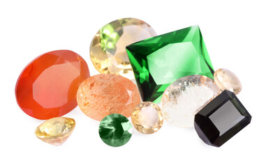 Different colorful shiny gemstones isolated on white