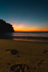 A stunning sunset over Taganga in Colombia, where nature presents us with a dazzling display of vibrant colors.