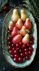 Pears and cherries on antique platter.
