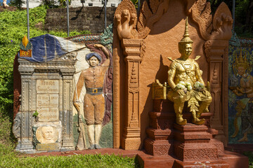 bas-relief memorial, located just below the Wat Phnom represents the retrocession to Cambodia by...