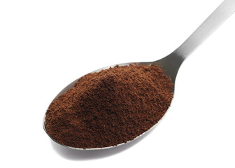 Pile of powder instant coffee in metal spoon isolated on white background, clipping path