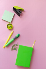 stationery on a light pink background