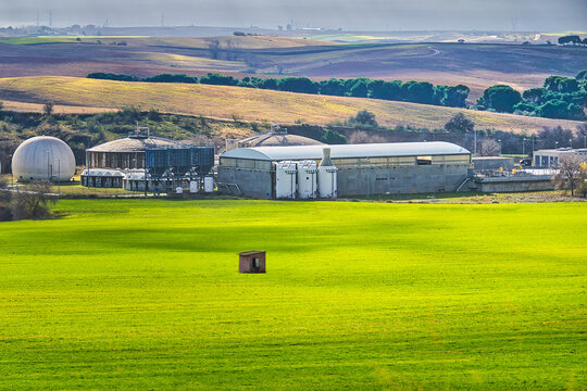 "La Reguera" wastewater treatment plant, surrounded by green wheat fields, in M&oacute;stoles, Madrid (Spain).