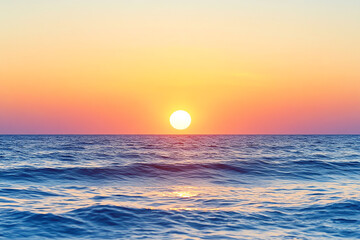 A breathtaking sunset over the calm ocean, casting vibrant hues across the sky and reflecting beautifully on the water's surface.
