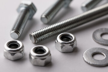 Close up of steel bolts nuts and washers