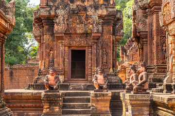 Statues guarding at the entrance to hindu Banteay Srei khmer temple, Angkor Archaeological Park, Siem Reap, Cambodia