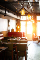 Natural restaurant interior with scenic view at sunset