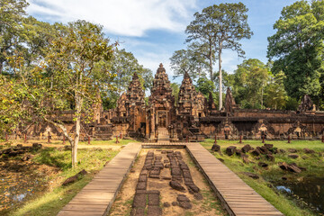 Hidden in jungles hindu Banteay Srei khmer ruined temple entrance, Angkor Archaeological Park, Siem...