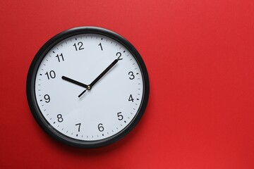 Big beautiful stylish clock on color background