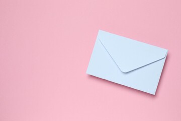 Paper envelope on color background