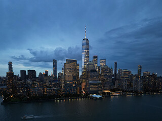 Obraz premium NYC aerial night view. New York City skyline, cityscape of Manhattan in USA. New York City NYC Manhattan Downtown Skyline, from Jersey City USA.