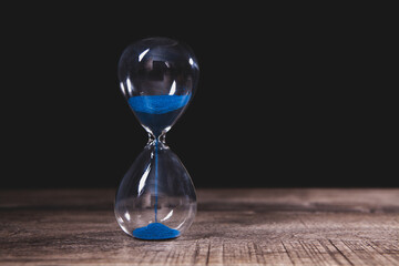hourglass on the dark background