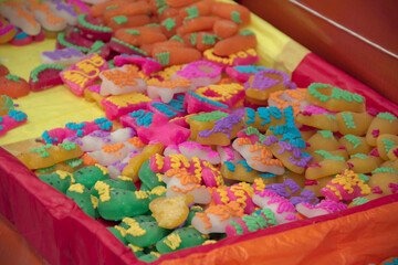 Mexican day of the dead candies piled a market stall at Puebla City.