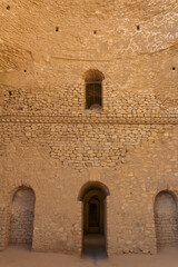 Texture of the stone walls of ruins of Palace of Ardashir Pāpakan built in 224 A.D in Fars province, Iran. 