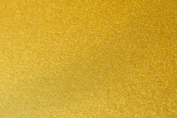 Fototapeta premium Yellow fluffy velvet texture background. Yellow velvet fabric