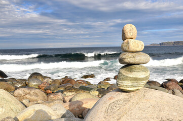 Rolling waves on a rocky beach. The coast of the Barents Sea