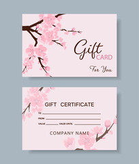Gift card with sakura flowers. Cherry blossom background. © Katerina