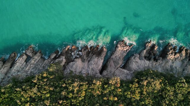 View from the copter on the cliffs, sea coast. Nature of Montenegro, Lustica peninsula, seascape with clear azure water. Summer tourist background