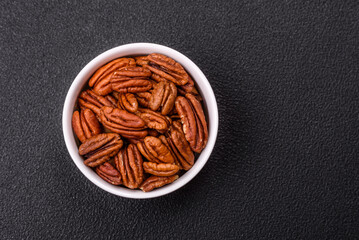Delicious nutritious pecan nuts in ceramic bowl