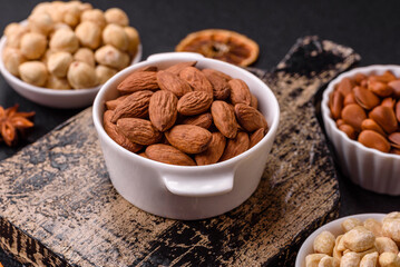 Delicious nutritious almond nuts in ceramic bowl