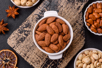 Delicious nutritious almond nuts in ceramic bowl