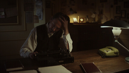 Frustrated writer suffering from writer's block in