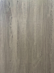 Obraz premium Texture of wood background closeup, top view, smooth surface with natural pattern and various wood grain and knots details.