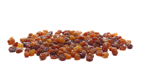 Heap of red raisins isolated on white background, side view