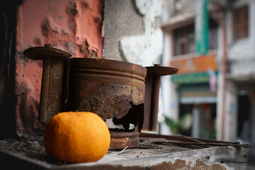 Small house altar with mandarine offering for Chinese new year in Georgetwon, Penang, Malaysia