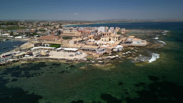 Drone Footage of Marzamemi, Sicily | Aerial View of Historic Coastal Village
Stunning drone footage of Marzamemi, Sicily&mdash;capturing the charm of its historic coastal village