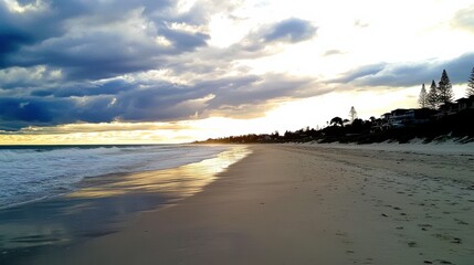 Obraz premium Dramatic Sunset Over Serene Beach Landscape