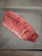 Fresh Sliced carp fillet prepared for christmas dinner baking on a tray