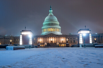 Washington D. C. in night winter snow. Capitol Building in night. Washington city Capitol. United States Capital. USA landmark. Washington D.C. Night Washington Capital city.