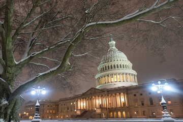 Washington DC in night winter. American Capitol Building in snow. Washington city Capitol. United...