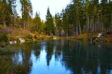 Kreda lake near Mojstrana in Gorenjska, Slovenia with surface covered in ice